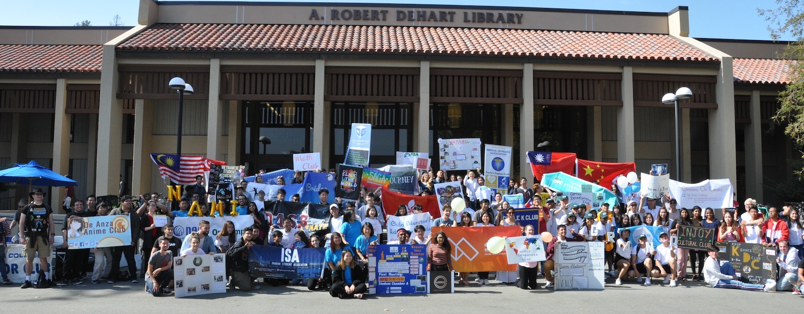 student club representatives in front of library